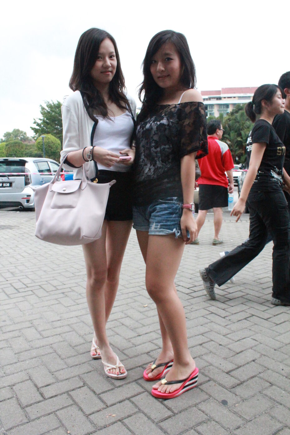 Friends Katherine Ong(left) and Rabecca Tan work their layers