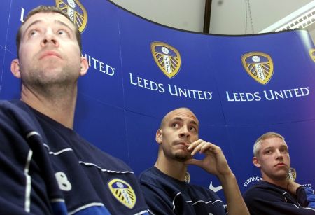 Ferdinand (center) at a press conference during his days as a Leeds United player with Nigel Martyn (left) and future Manchester United teammate Alan Smith (right).