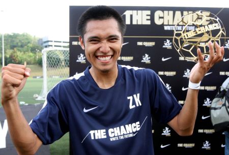 Mohamad Zaky Zulkifli with his trophy, which comes with a ticket to the Nike Academy in London for a one-week trial under Arsene Wenger.