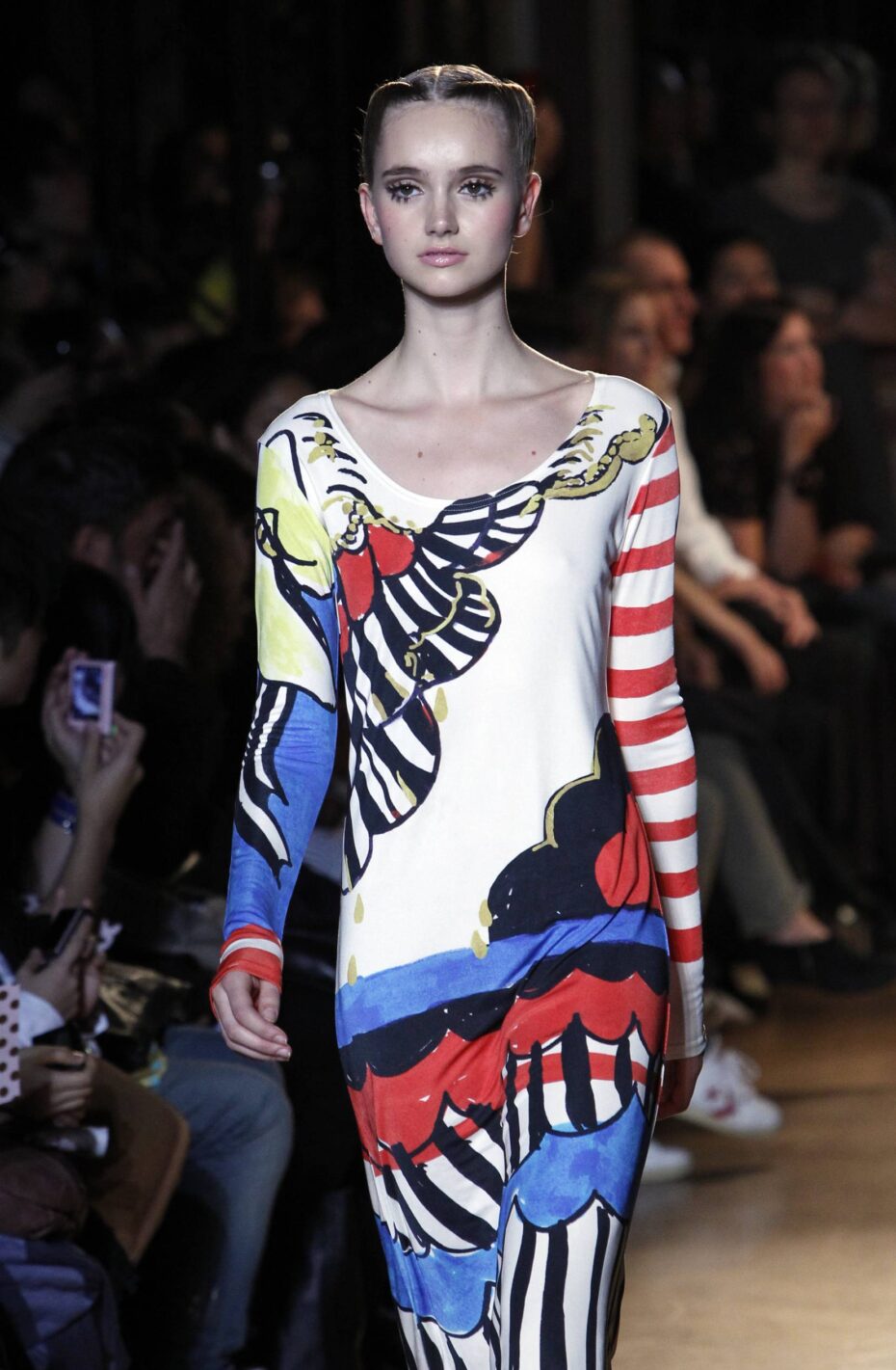 A model presents a creation by Japanese fashion designer Tsumori Chisato as part of her ready to wear spring-summer 2011 fashion collection