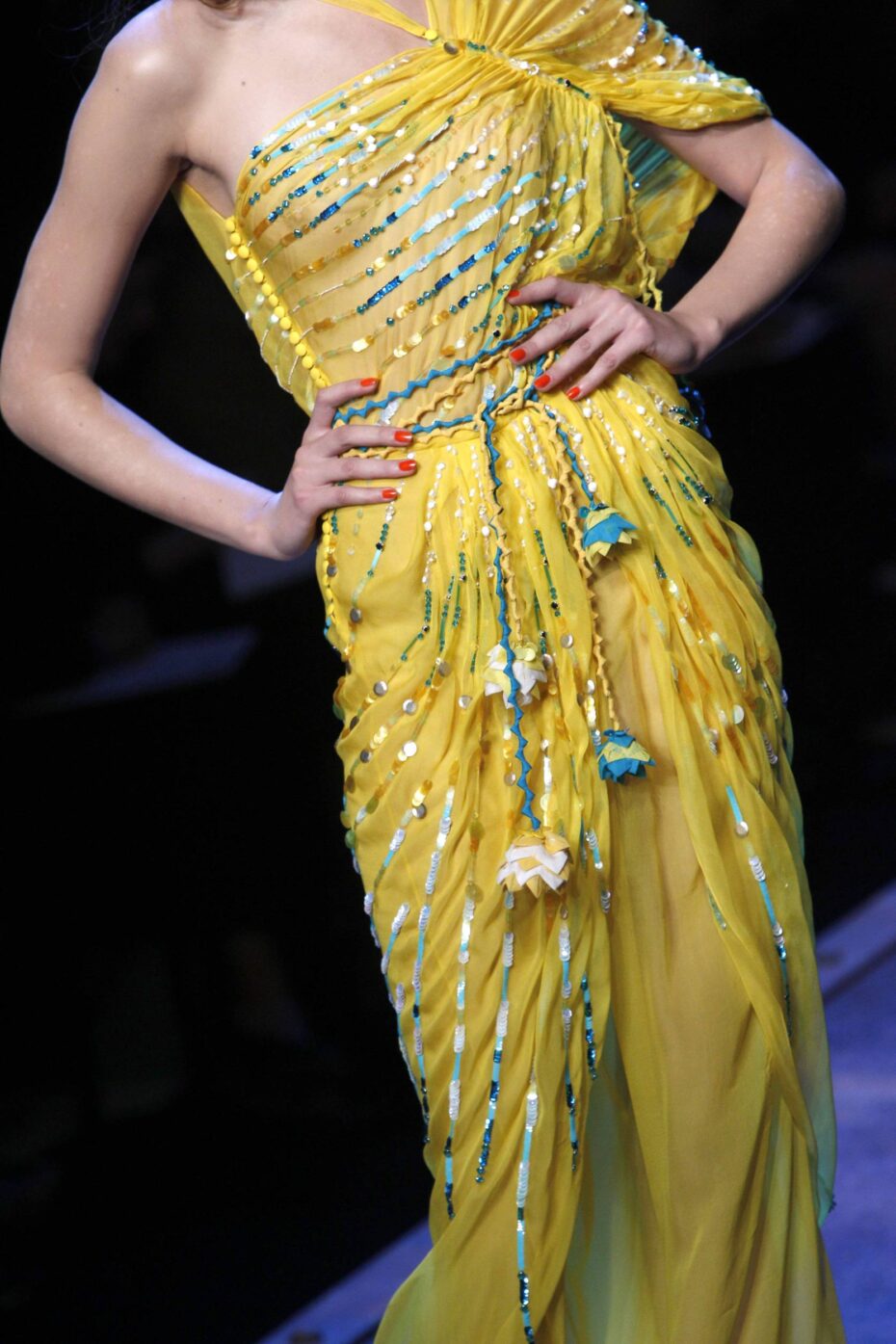 A model presents a creation by British fashion designer John Galliano, as part of the Christian Dior ready to wear spring-summer 2011 fashion collection