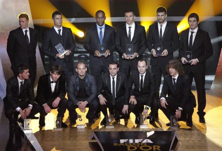 The FIFA World XI. Do they naturally get into that position whenever it's picture time and there's 11 of them? There's a 12th man in there, BTW, top left-hand corner. Wonder if he's there to represent the fans...