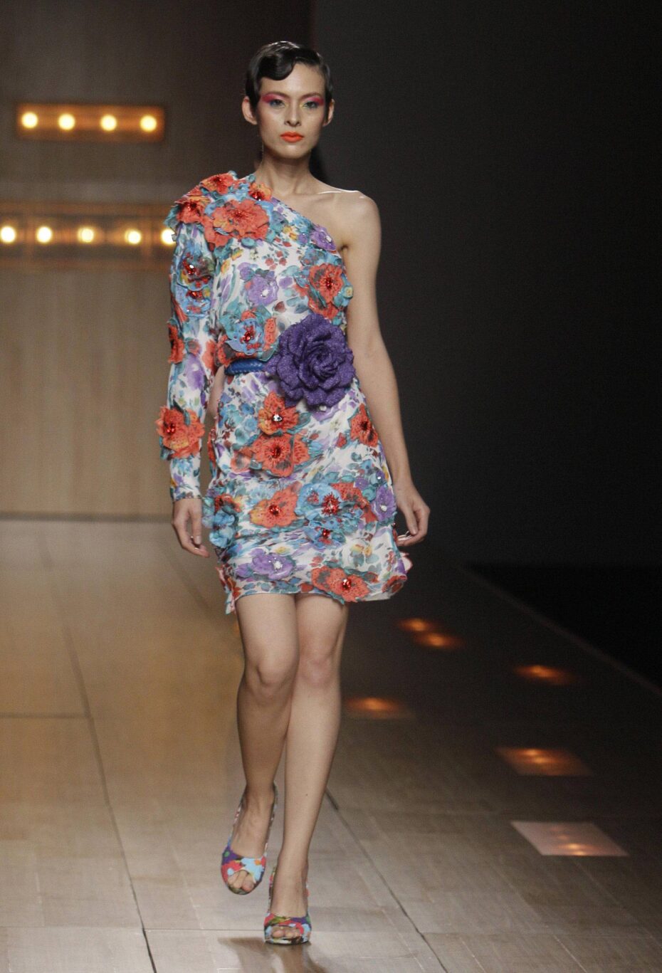 A model displays a creation by designer Charmklea Ktikasemkul during the Bangkok Fashion Week in Bangkok, Thailand