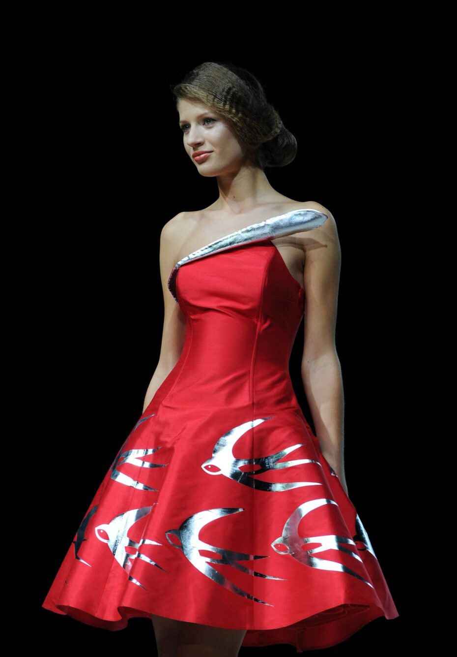 A model displays a creation by Russian designer Pavel Yerokin during Moscow Fashion Week in Moscow