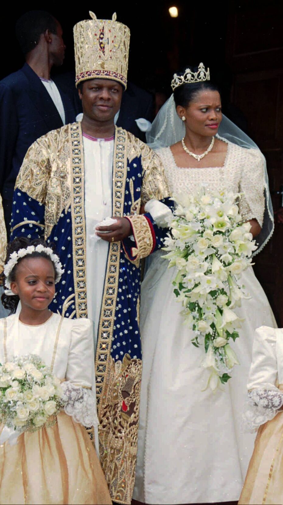 The king of Uganda's Buganda tribe, Kabaka Ronald Muwenda Mutebi II, and his wife Queen Sylvier Nagginda after their wedding in 1999