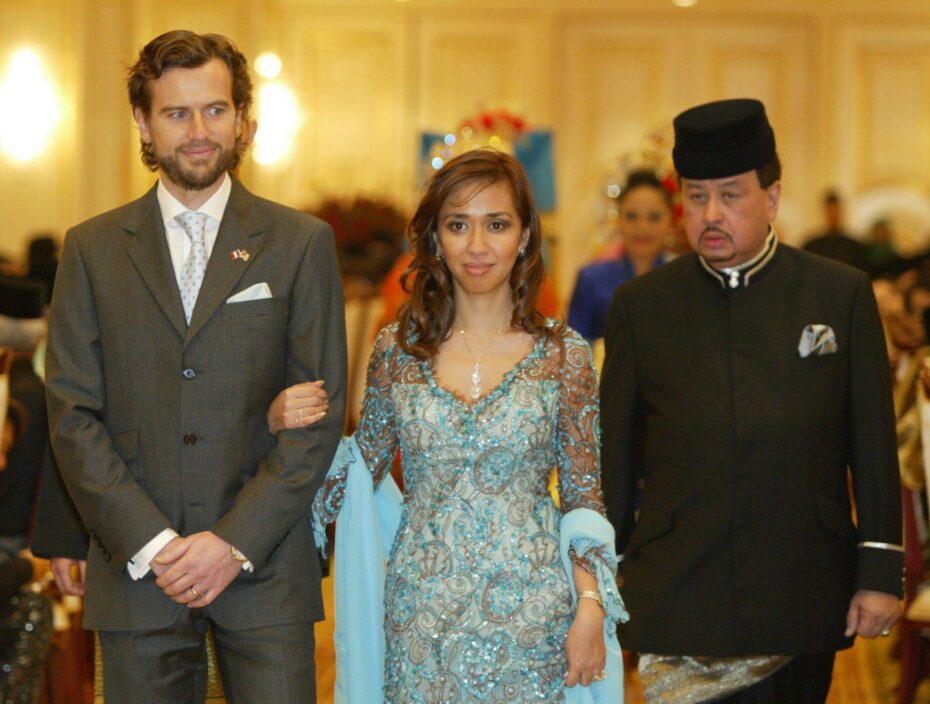 Daughter of Sultan of Selangor Sultan Sharafuddin Idris Shah, Tengku Zatashah Idris (centre) and Aubry Rahim Mennesson (left), at their wedding reception in 2008.