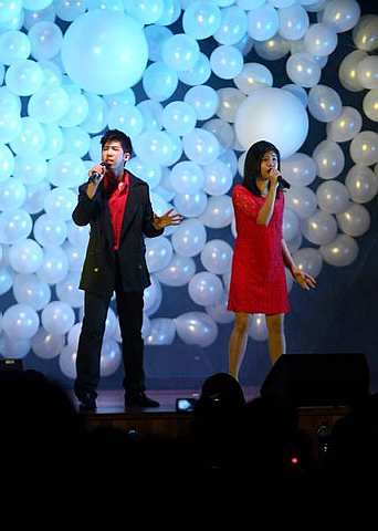 Yong Zheng Xi (left) and Joanna Tan