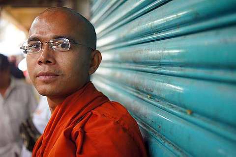 snap2 The lines of the shutter converge on a close-up portrait of the young monk
