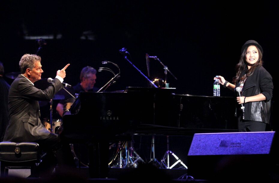Charice performing with David Foster during the David Foster &amp; Friends-Live in Asia 2011 concert at the Bukit Jalil Indoor Stadium in Kuala Lumpur.