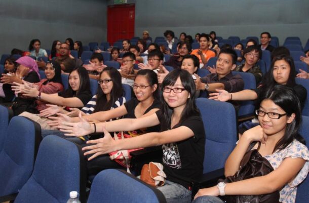 Some participants having fun during the interactive segment of the forum.