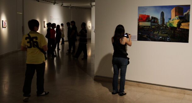 YFSAITO A visitor having a look at a photo by The Star photographer Art Chen, one of the 54 images at the exhibition.