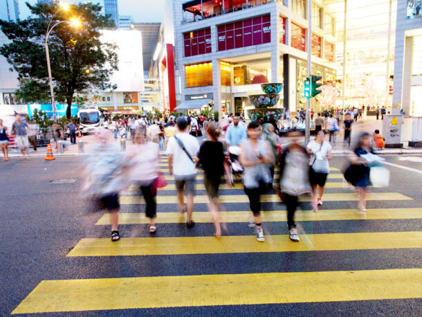 OLYMPUS DIGITAL CAMERA Picasa A busy street in front of Pavilion KL in the evening.