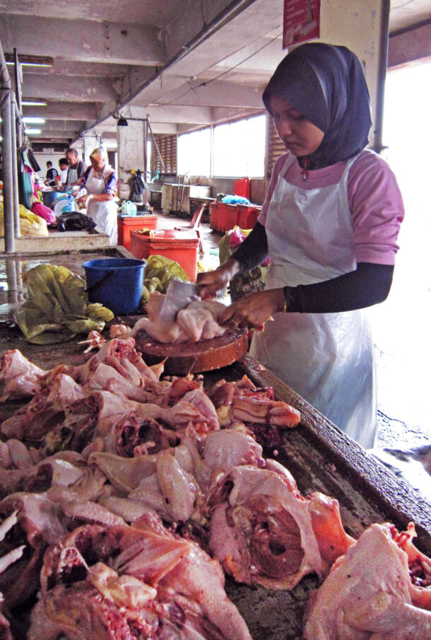 IMG_2487fixed Nur Hassanah Zahari, 22 hard at work running her stall at the market.