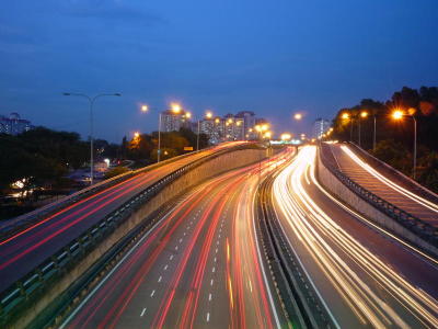 Cars cruising on MRR2 as the sun slowly sets.