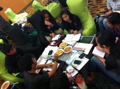 Some of the participants discussing ideas and solutions to help solve issues that may arise in teen relationships.