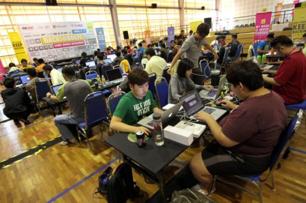 Mobile app developers and designers hard at work during the Hackathon (HACK!@DGCFC).