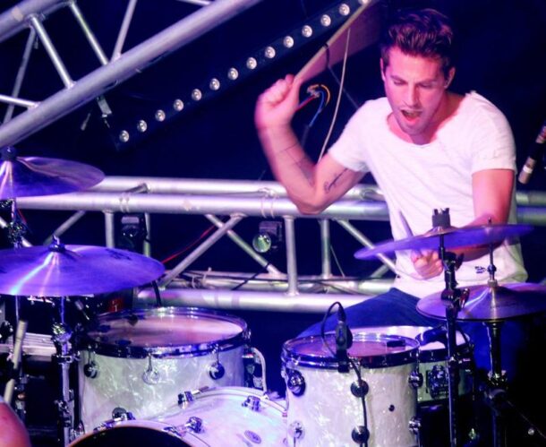 Drummer Adam Pitts going all out on his drums.