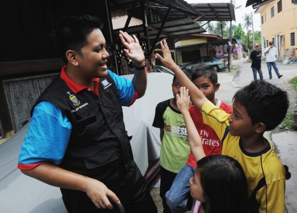 Dr. Afif Bahardin interacting with the kids.