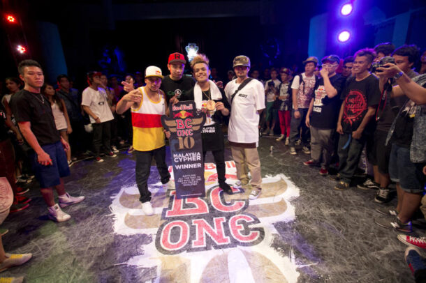 Champion B-boy Khenobu with the judges B-boy Sabamon, B-boy True Colours and Red Bull All Stars BBoy Roxrite at the Red Bull BC One Malaysia Cypher at Chin Woo Stadium.