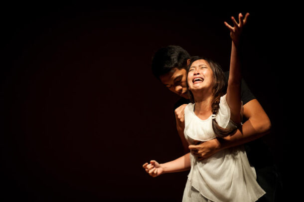 Rhyz Ruslan and Chew Aileen from the Taylors Society of Performing Arts performing a play titled 'Dancing With The Devil'.