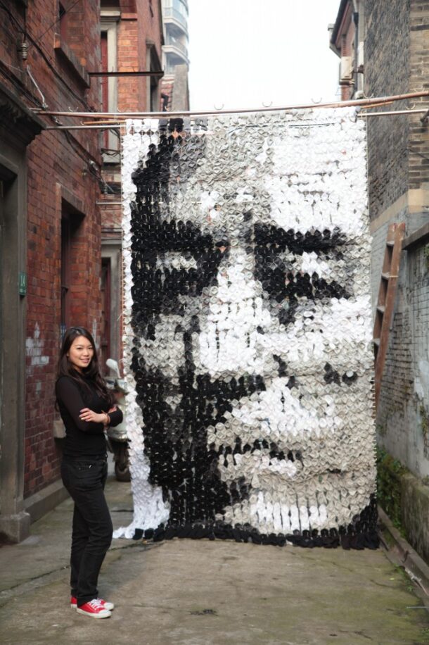 Hong with the Zhang Yimou portrait.