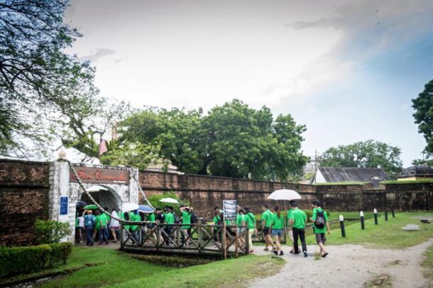 The international participants of the International Student Conference 2013 getting a tour of Fort Cornwallis.