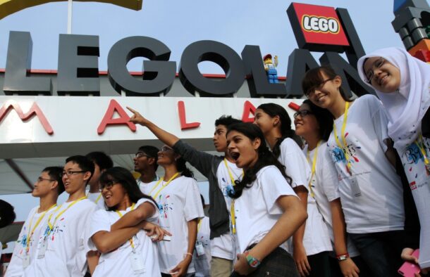 The BRATs participants posing in front of the entrance to Legoland Malaysia.