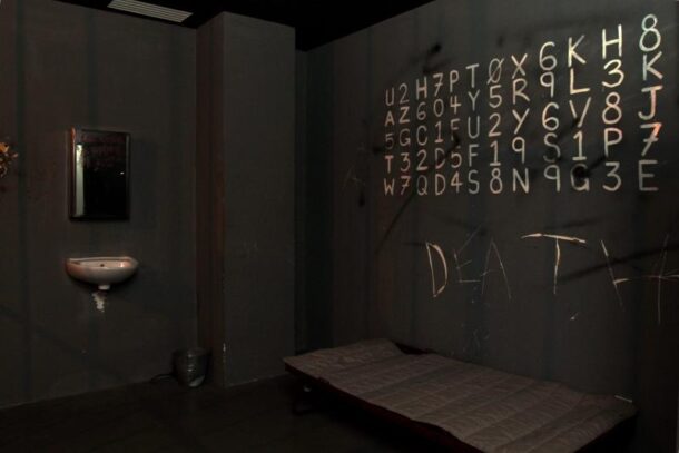 "Prison Break" is a prison-themed room at Escape Room, where you are handcuffed and blindfolded.