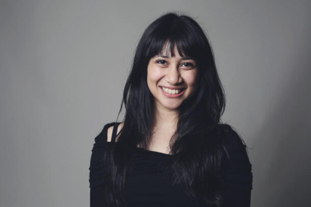 After spending her early years in the UK and then back to Malaysia for a decade, Aiman Ahmad Marzio is currently pursuing Theatre Performance at Interlochen Center For The Arts in Michigan.