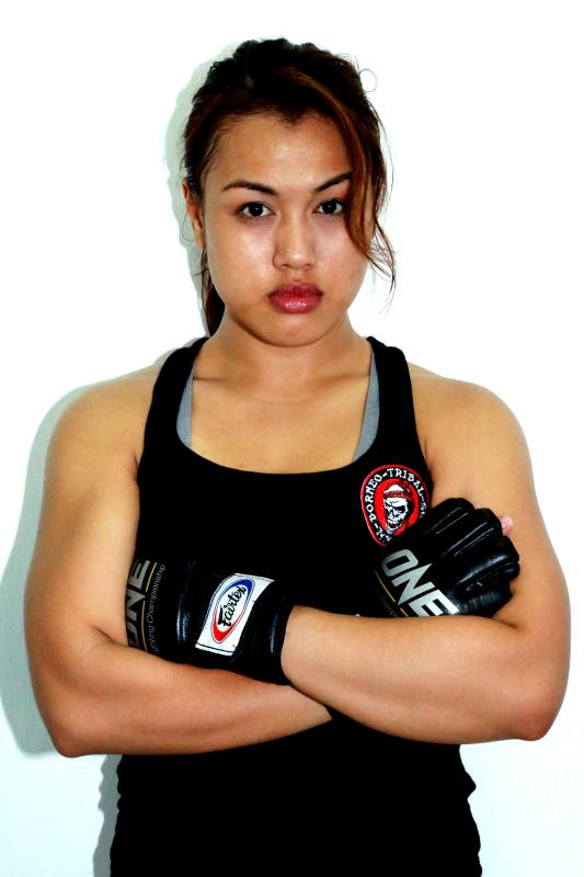 Breaking barriers: Professional mixed arts (MMA) fighter Ann Osman has caught the world's attention recently for smashing stereotypes of Asian women.