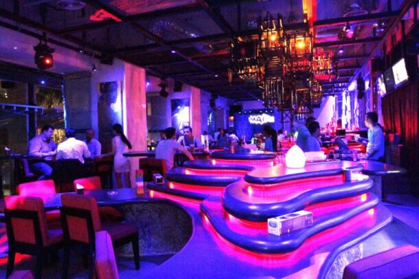 Mai Bar's interior is an ethereal display of Tiki-themed furniture and modernistic lighting.