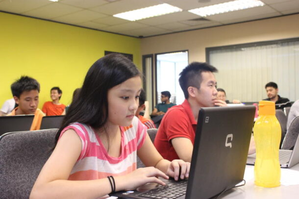 Family affair: Twelve-year-old Trinity Tay tagged along with her brother to attend the event.