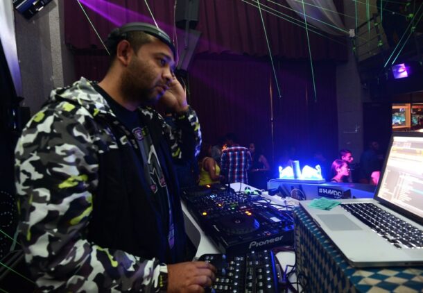 DJ Adrian works his magic on the turntables at Lust.