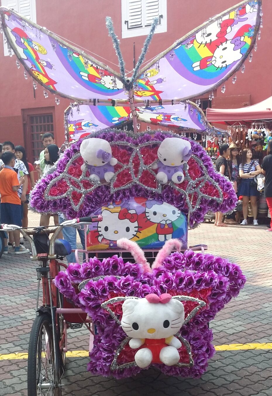 The trishaw riders say the more colourful the trishaw, the better. Kids love 'em and that means their parents have to as well!