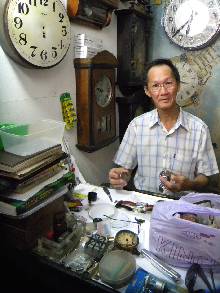Watch man: Watch repair expert Chan Kim Wah learned his skills from his father, at the very same workshop he currently runs on Malacca's famous Jonker Street.