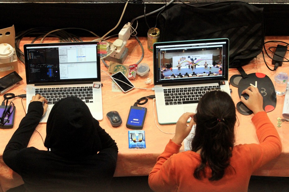 The video editors at CHEER 2015 worked tirelessly to fine-tune and hone the teams' performance videos and got each one done in record time! -- Photo: SAM THAM/The Star