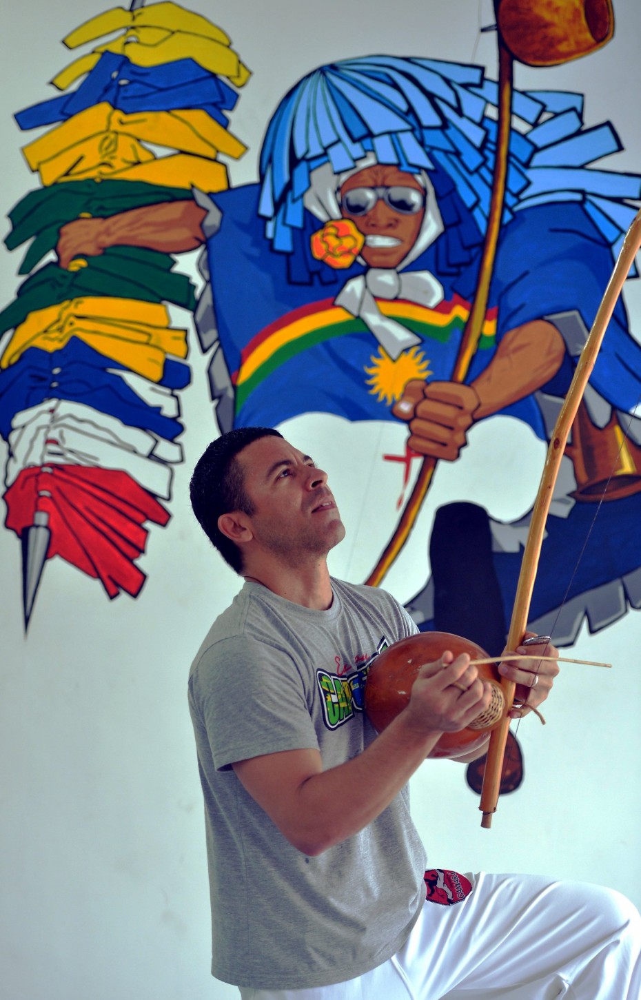 Cristiano demonstrates how to create capoeira's haunting music using the traditional berimbau. The 40-year-old has been a capoeirista for 23 years, but his passion for the sport still burns strong. ― RAJA FAISAL HISHAN/The Star