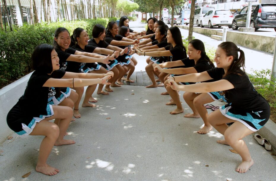 Hold it – The Cyrens demonstrating one of the exercises they do to strengthen their core and thigh muscles.
