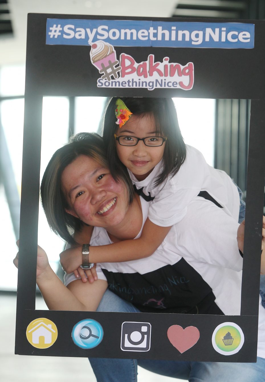 Tay (left) said Choy's determination helps her focus on the positive. ― Photo: NORAFIFI EHSAN/The Star