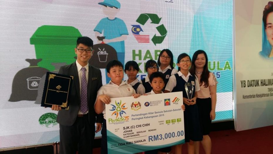 Ka (far left) along with his students after winning the national recycling award.