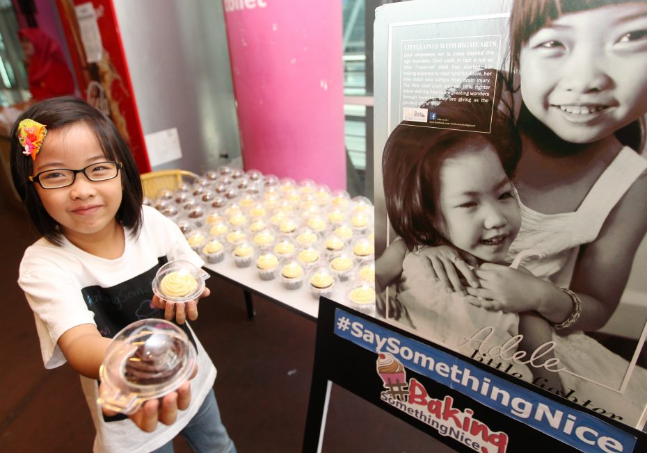 Leah Choy, seven, learnt how to bake to raise funds for her sister, who has cerebral palsy. Now, she raises funds for various causes including the disabled and the Rohingya boat people.<br>— Photo: NORAFIFI EHSAN/The Star