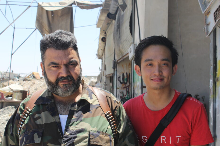Lau with one of the commanders of the Free Syrian Army in 2012. The NGO that hosted him was based on the rebel-held part of Aleppo. Photo: Chris Lau.